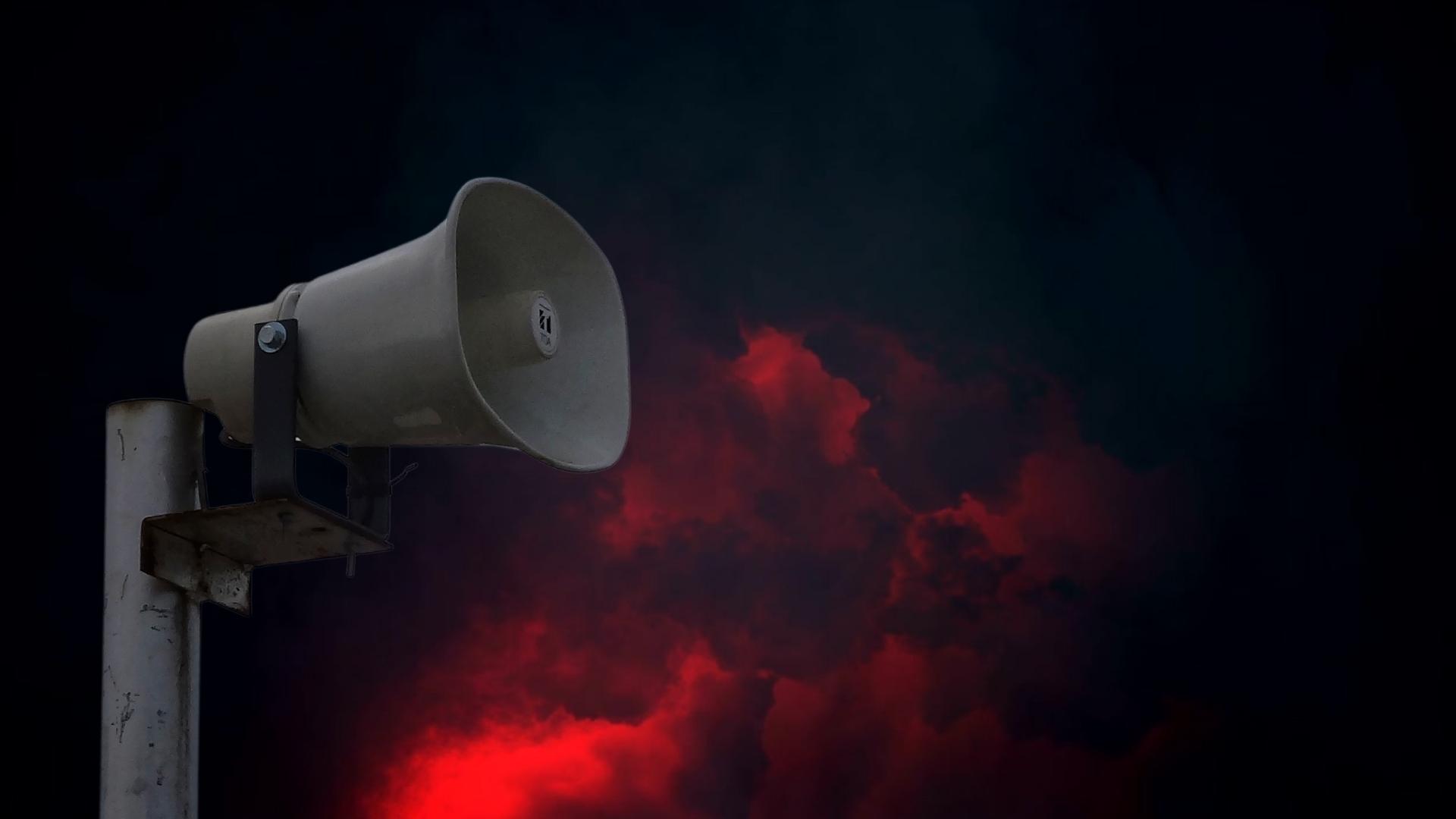 Emergency Warning Sirens Sound During Storm